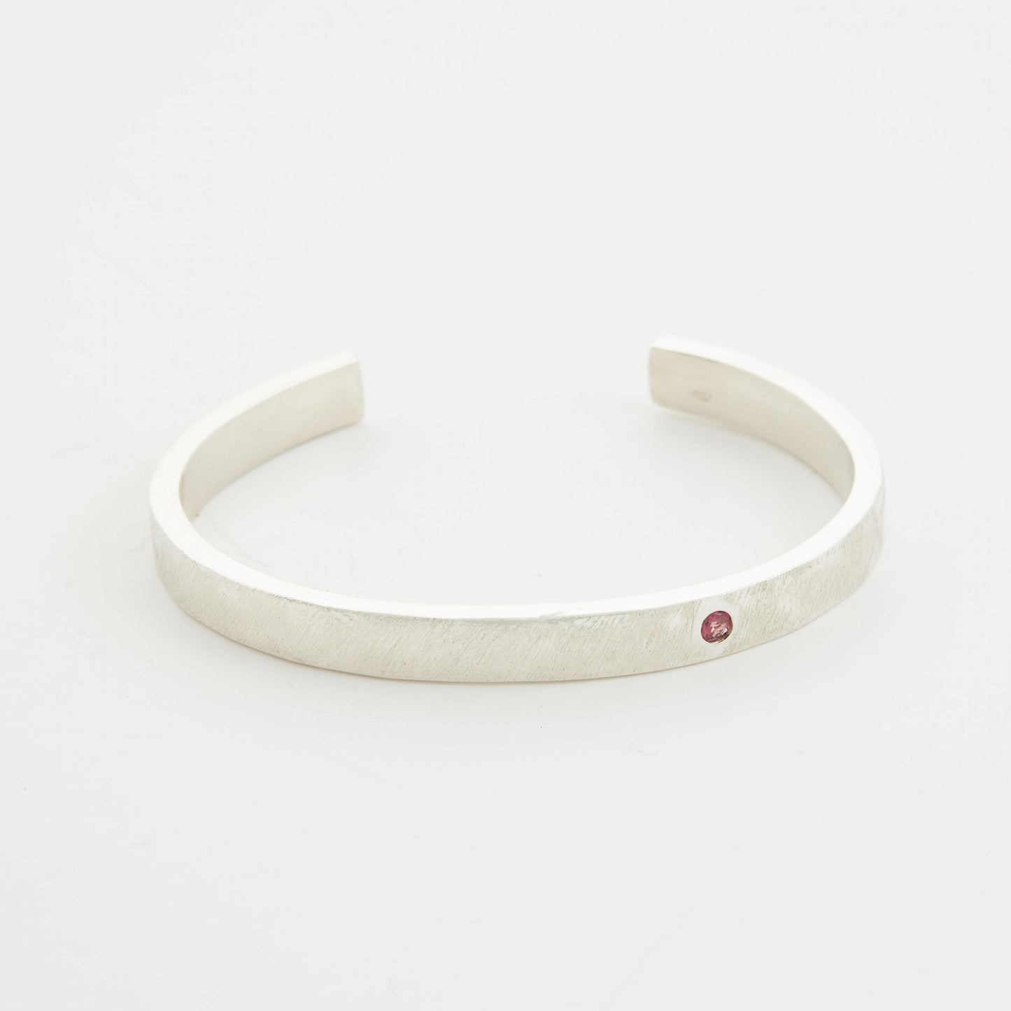 File Textured Silver Bangle With Pink Tourmaline Stone.