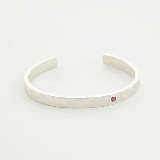 File Textured Silver Bangle With Pink Tourmaline Stone.